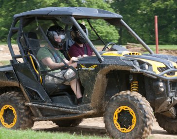 Ali and James in an ATV