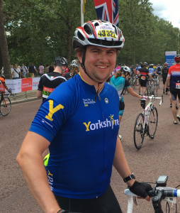 James S holding his bike